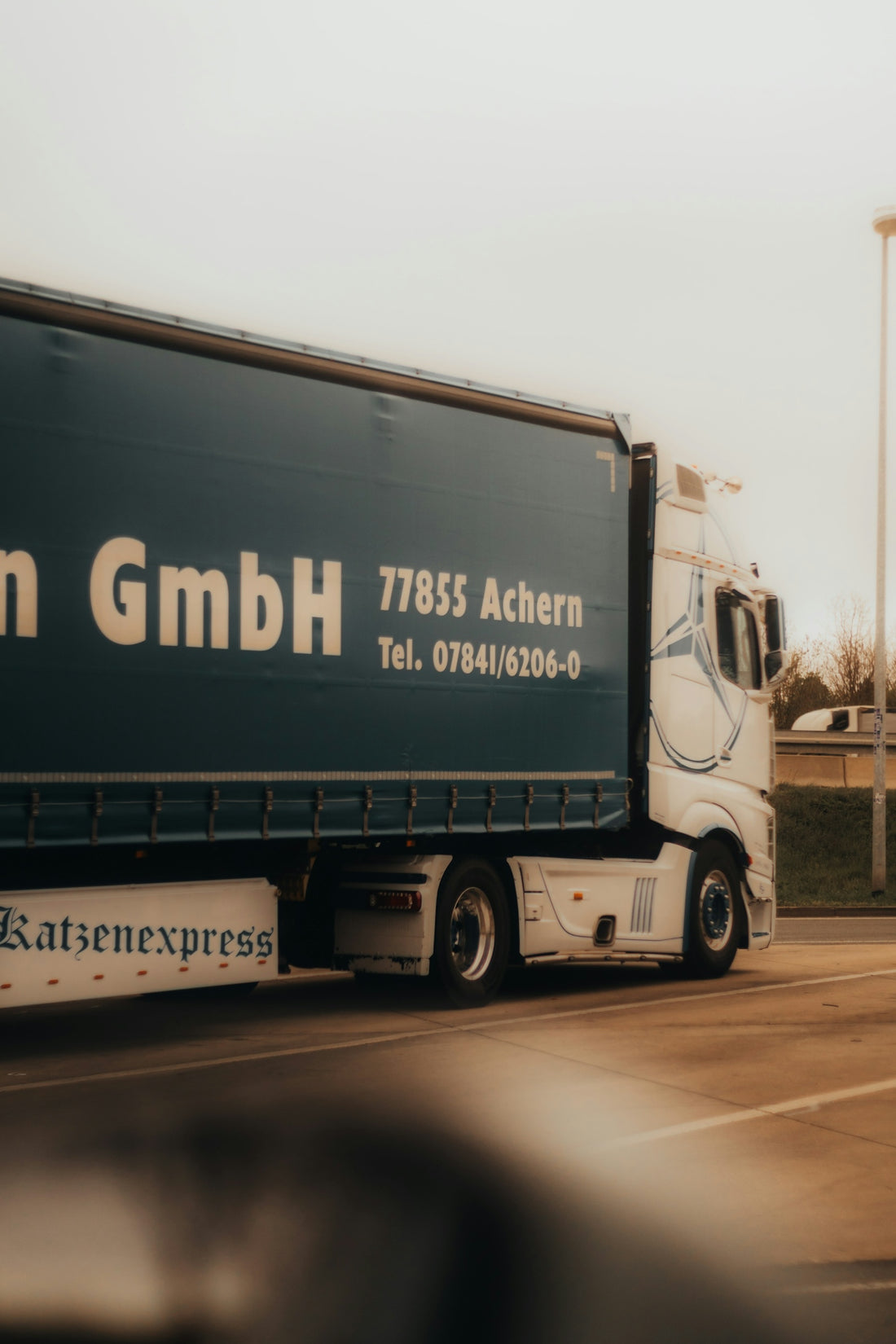 White truck with katzenexpress on side