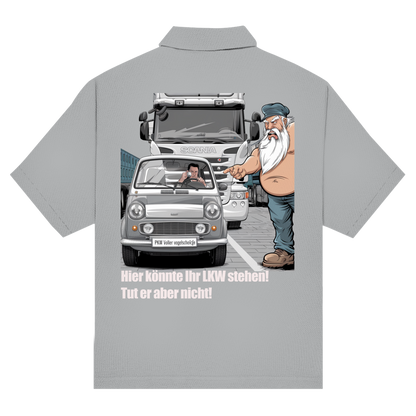 Unisex Poloshirt „Mini blockiert – Trucker explodiert“